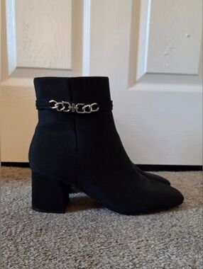 Stylish Black Ankle Boot with Chain Accent